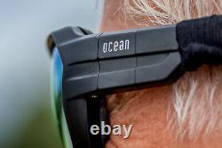 OCEAN CHAMELEON Floating Sunglasses Kiteboarding Surf Shiny Black & Blue Lens