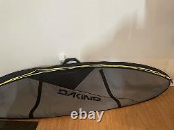 Surfboard travel bag Dakine. Used on just one trip